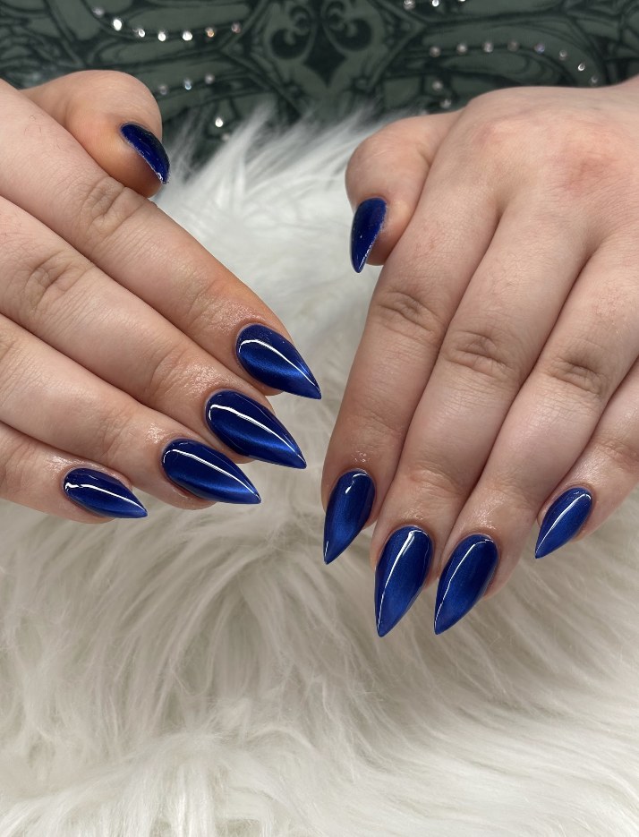 Blue cat-eye stiletto nails